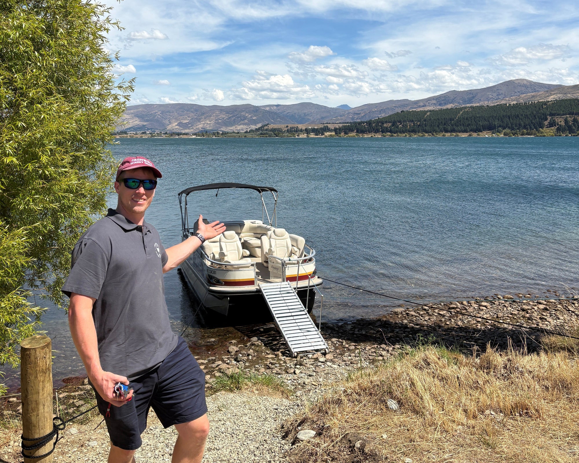 Cromwell Winery Cruises boat tour showcasing scenic views of vineyards and the water during a relaxing cruise experience.